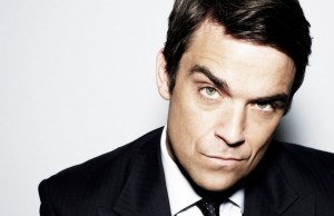 Robbie Williams flirta con una teenager (VIDEO)